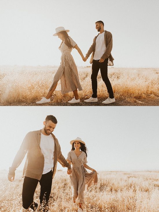 Couple posing in coordinated pre-wedding outfits during an outdoor photoshoot